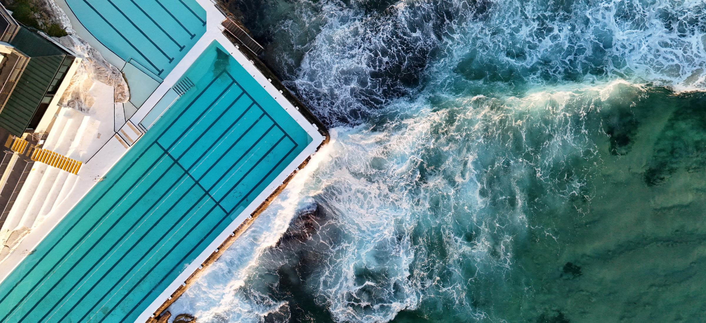 Aerial drone shot of an ocean pool in Sydney