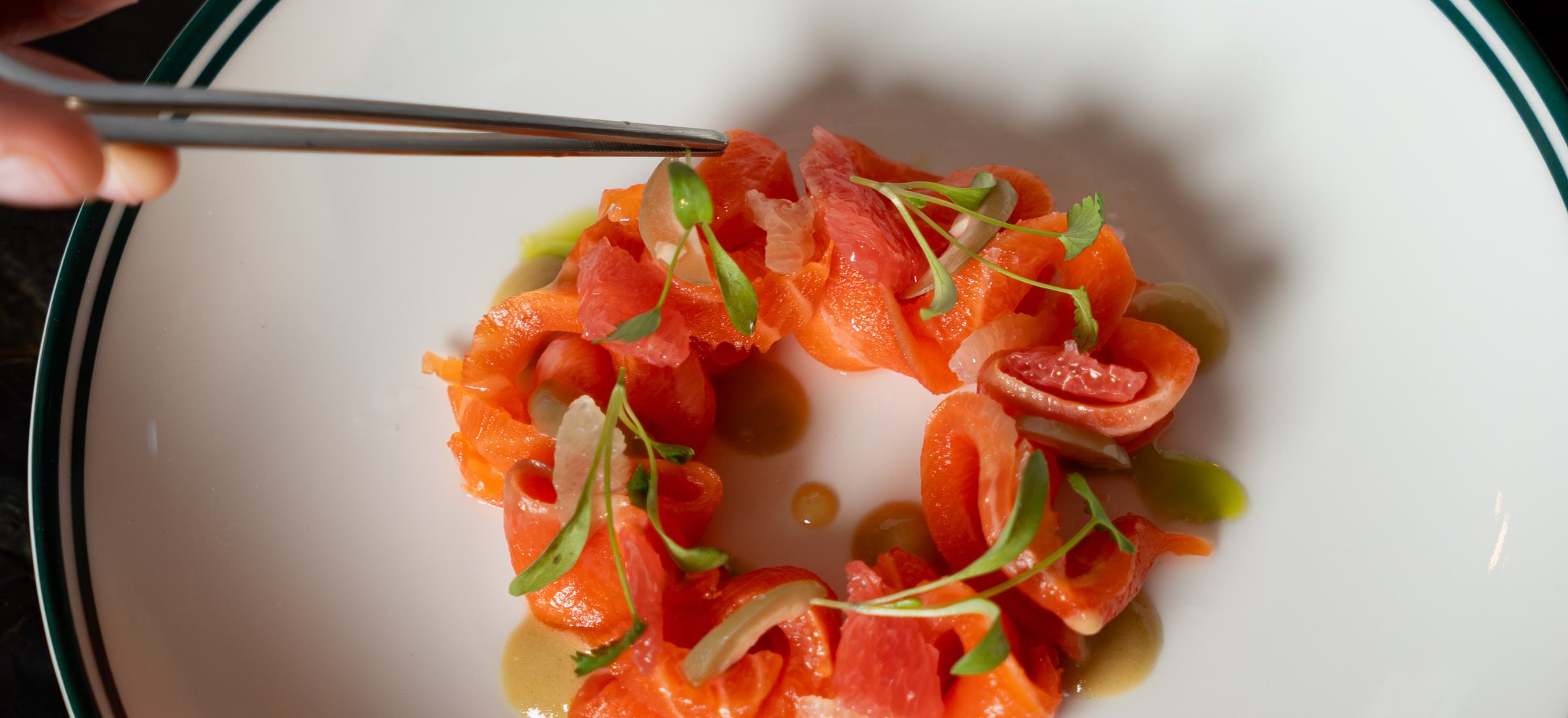 Salmon crudo dish photographed for a restaurant